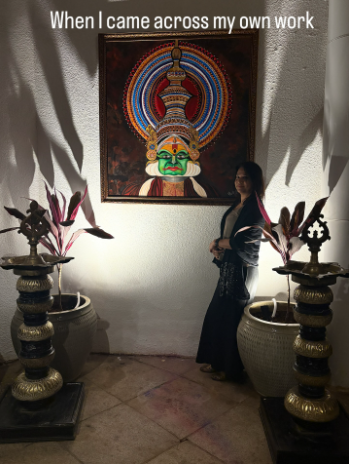 Artist with painting